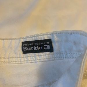 White distressed patches jeans